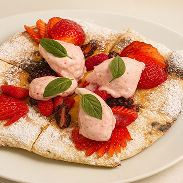 Copa de helado artesanal de pistache y avellana